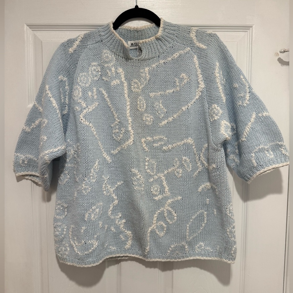 Vintage women’s light blue Illustrations hand-knit sweater